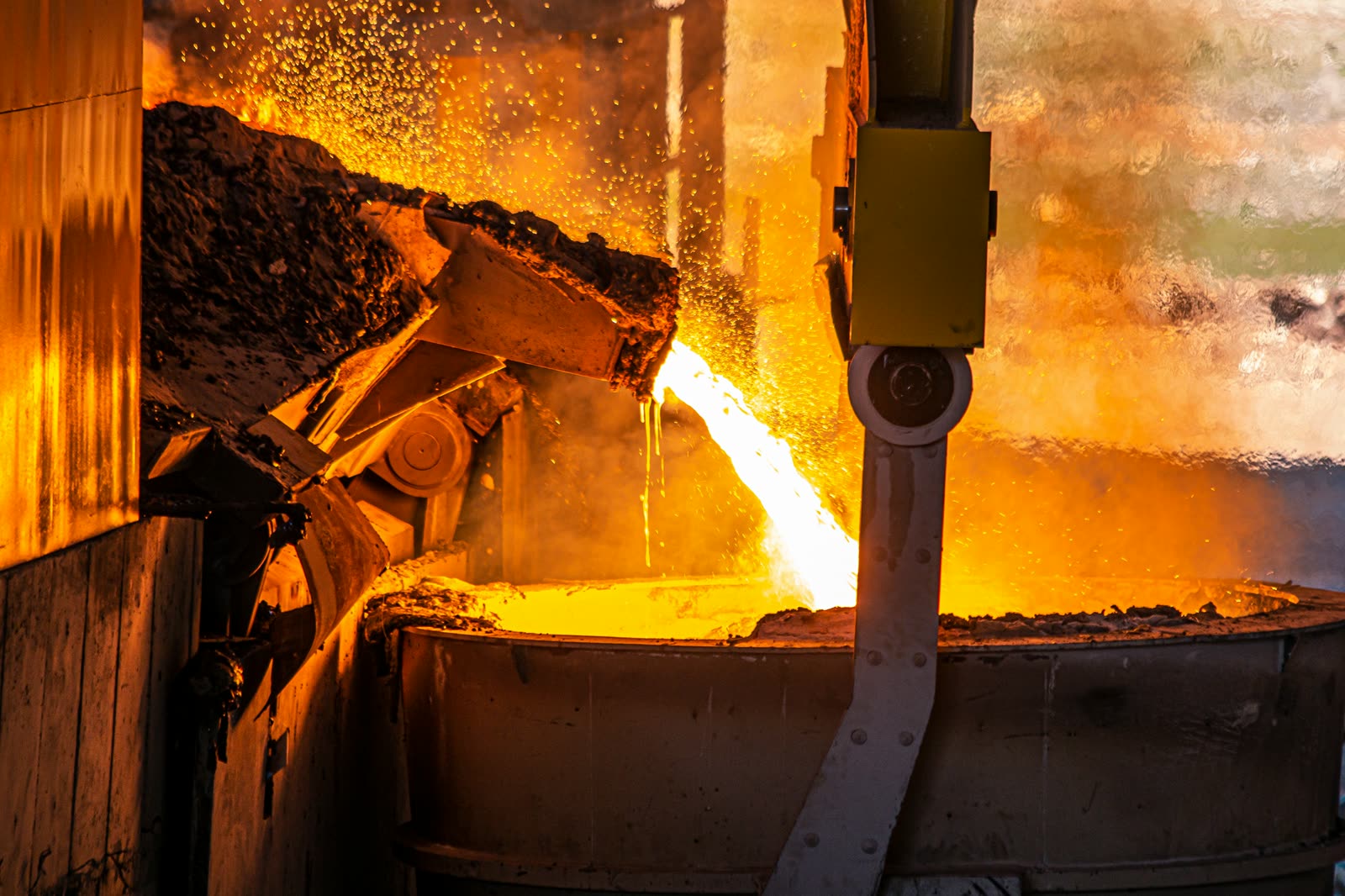 Charging and tapping a smelting furnace