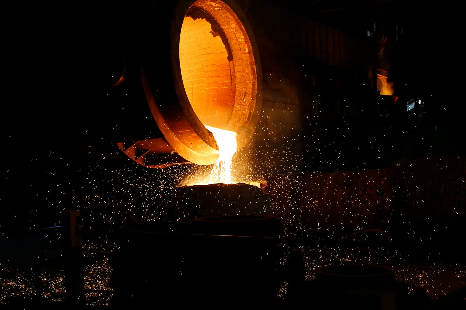 Glowing refractory brick lining inside a steel ladle